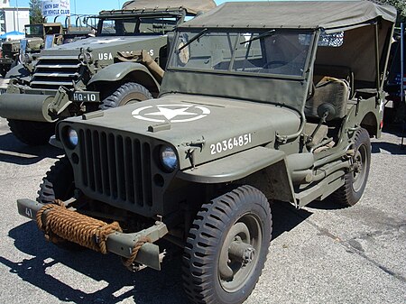 A covered Willys MB/Ford 